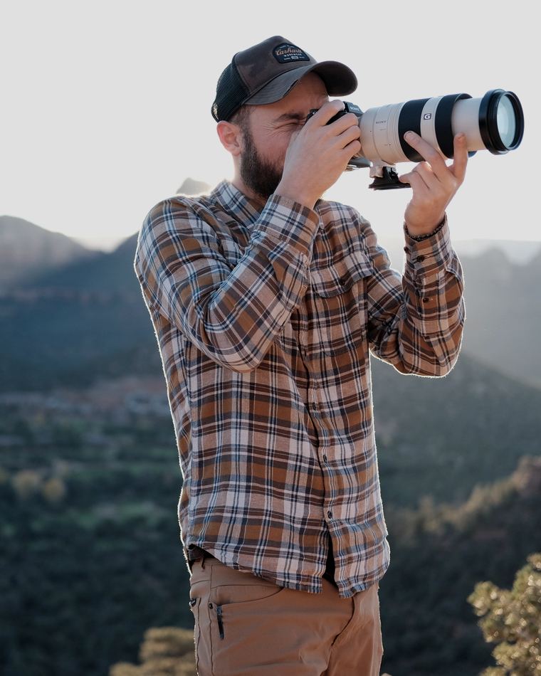 Ryan, filmmaker and editor, shooting on location